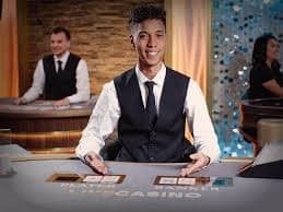 live dealer table with betting interface and chat panel